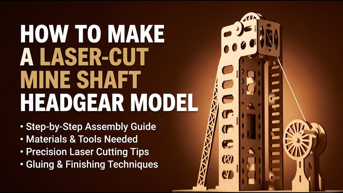 A laser-cut MDF mine shaft headgear model with its sheave wheel, lattice back-stay and winding drum